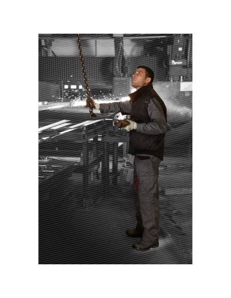 Gilet multi-poches (coordonnŽ® gamme D-MACH). Fermeture par zip anti froid sous rabat agrippant. Bas devant et cotŽ® dos du